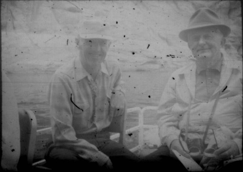 Two unidentified men (Peters relatives?) sitting in a boat
