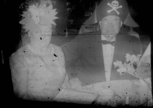 Unidentified man and woman wearing party attire aboard the M/S Stella Polaris