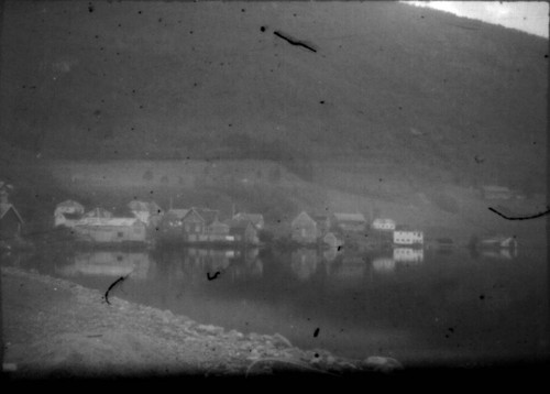 Unknown village on the banks of a fjord