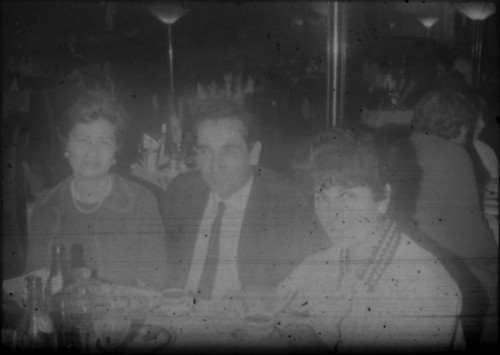 Alice Peters and others gathered around a table