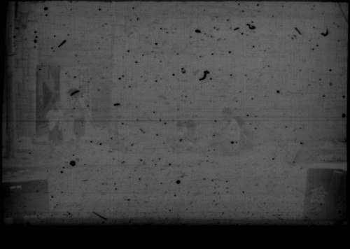 Group of children playing on a street corner