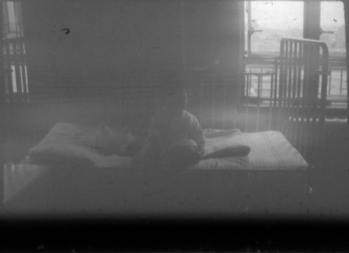 Child in hospital bed