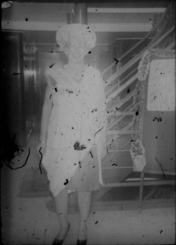 Unidentified woman at bottom of stairwell aboard cruise ship