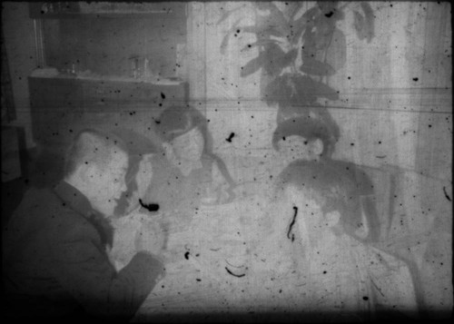 Japanese family gathered around a table