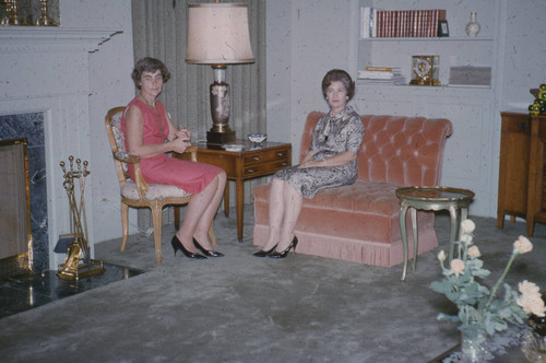 Alice Peters with guest in Peters residence