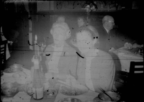 Two unidentified women seated at a restaurant