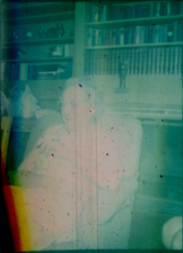 Unidentified woman sitting in an armchair