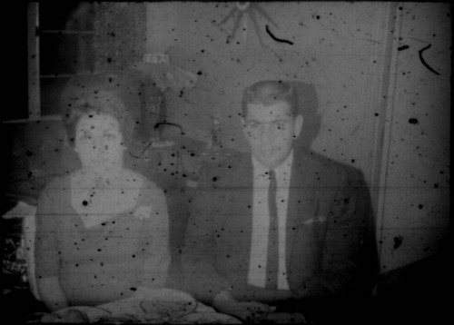 Unidentified man and woman seated at a table (Peters relatives?)