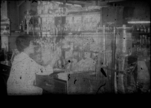 Woman in unidentified shop