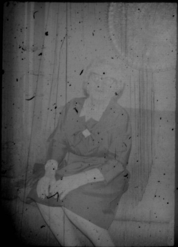 Unidentified woman (Peters relative?) seated on a couch