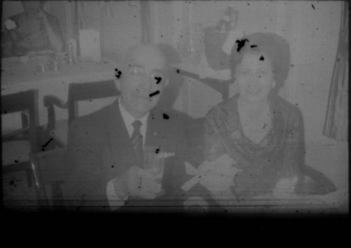 Leon and Alice Peters seated at a table