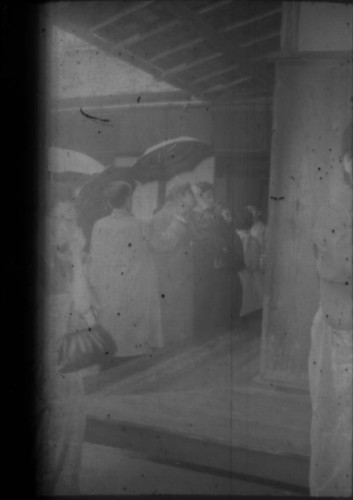 Group of unidentified people gathered at a temple