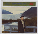 Leon S. Peters standing in front of the Mendenhall Glacier