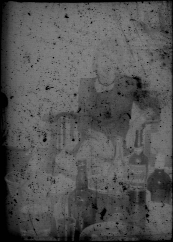 Unidentified woman seated at a table