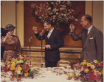 George Deukmejian toasting with Queen Elizabeth II and Prince Philip