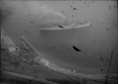 View of cruise ship in unidentified harbor