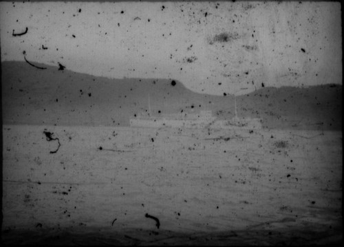 View of cruise ship and unidentified coastline