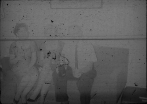 Alice Peters and others sitting on couch