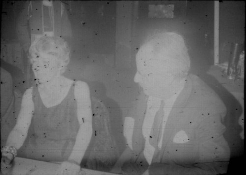 Unidentified man and woman in restaurant