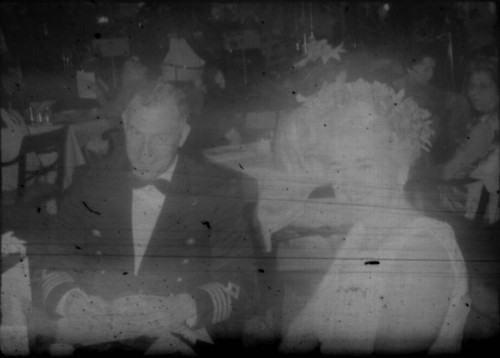 Ship's captain? and unidentified woman wearing party attire aboard the M/S Stella Polaris