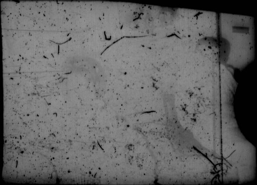 Unidentified people sitting on a couch (Peters relatives?)