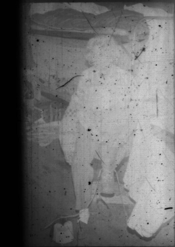 Unidentified woman in cabin at Myrtle Lake