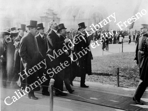 President Theodore Roosevelt touring the exposition with group of men