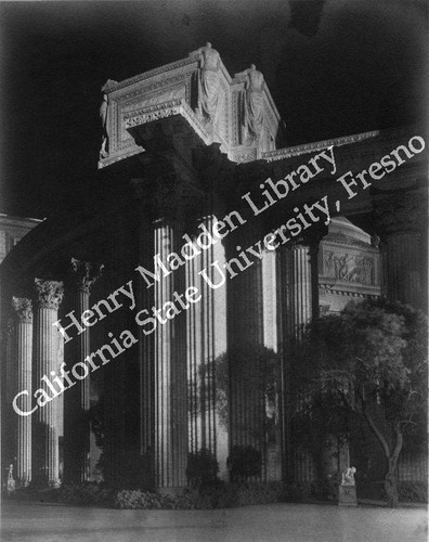 Tower on colonnade at Palace of Fine Arts at night