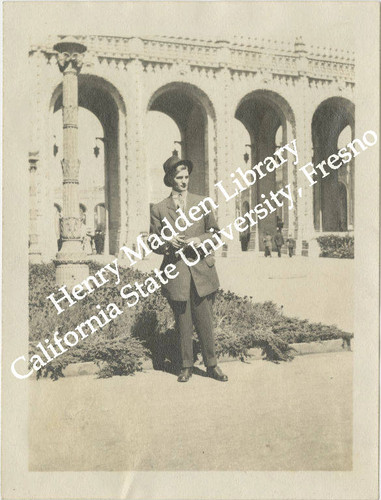 Male fairgoer at entrance to Court of Mines