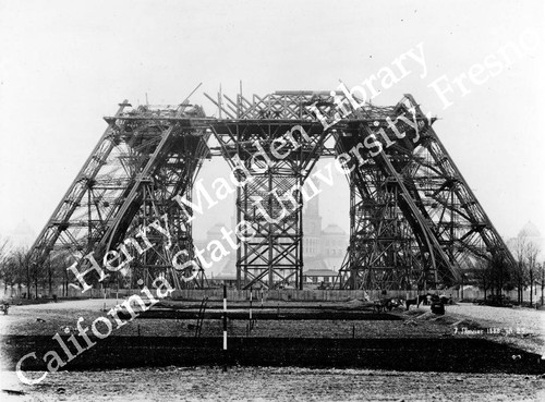 Front view of base of Eiffel Tower under construction