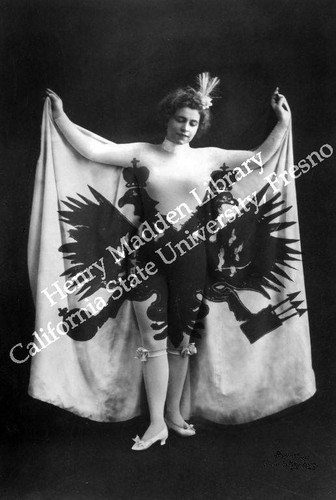 Woman displaying royal symbol