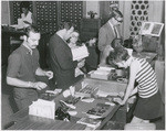 A busy moment in the Circulation Section-Loan Desk, California State Library, Sacramento, April, 1970