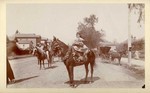 [View of girl on horse-back]