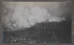 [Palace Hotel on fire. Roof and tower of Grand Hotel, foreground. Market and New Montgomery Sts.]