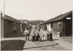 Looking down one of the streets in the 13th Avenue refugee camp - one year after