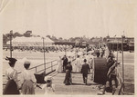 [People strolling along pier, Santa Cruz]