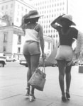 [Two women walking]