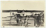 Blanche Scott in front of a biplane