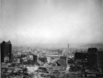 [Cityscape during reconstruction. View from above South of Market district looking towards Ferry Building, right center]