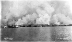 [View of city burning from San Francisco Bay. Ferry Building, center]