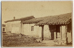 Tiled roof old adobe house