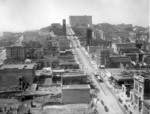 [View west on California St. toward Nob Hill and Fairmont Hotel during reconstruction. From Merchant's Exchange Building?]