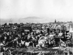 [Panoramic view of city from atop Fairmont Hotel. View looking east from Nob Hill toward Chinatown, the wholesale district, and Yerba Buena Island in the distance. St. Mary's Church on California St., right; Ferry Building in distance, right]