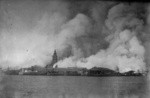 [View of Ferry Building and burning city from Bay]