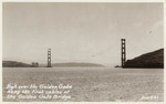 High over the Golden Gate hang the first cables of the Golden Gate Bridge