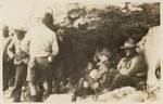 The famous shelter cave at the Saddle. There's where we kept warm for an hour with but a single candle. Walter, Bill, Jelly, Norm, Miggie, Nurmi, Neill, Helen and Bob. Note Jelly's track pants, the only pair that ever ascended the Grand Teton