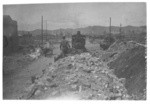 Hauling debris by steam engine on Mission Street, 1906