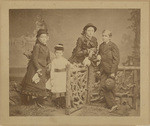 [Studio portrait of four children]