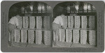 Lemons 22. Loading citrus fruits in R. R. car, crates being fastened together with strips, Lamanda Park, Calif., 56