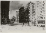 [Corner of Kearny, Geary, and Market Sts. During burning of Palace Hotel, center. Lotta's Fountain, right]